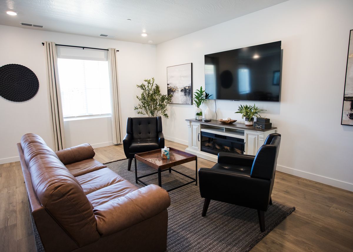 Living room with fireplace and accent chairs