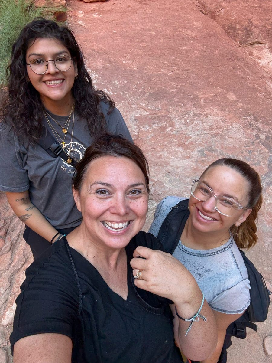 Three Bridge staff and guests smiling together