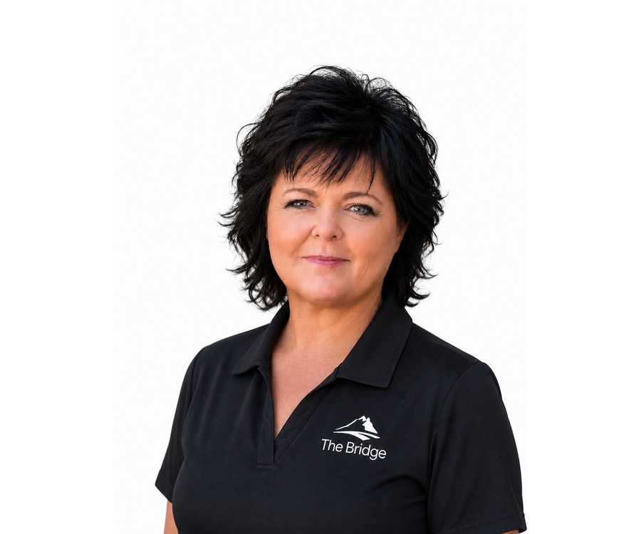 Christine Romero, LPN, Intake Specialist at The Bridge Health Recovery Center — supporting new guests entering residential care in New Harmony, Utah.