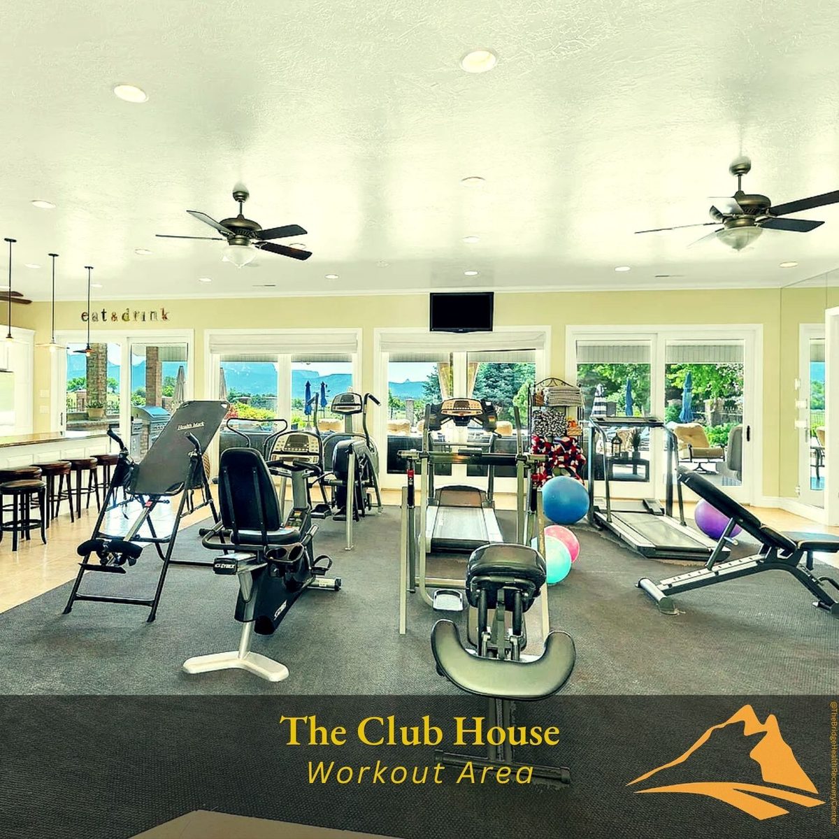 Fitness center with cardio and weight equipment at The Bridge Health Recovery Center