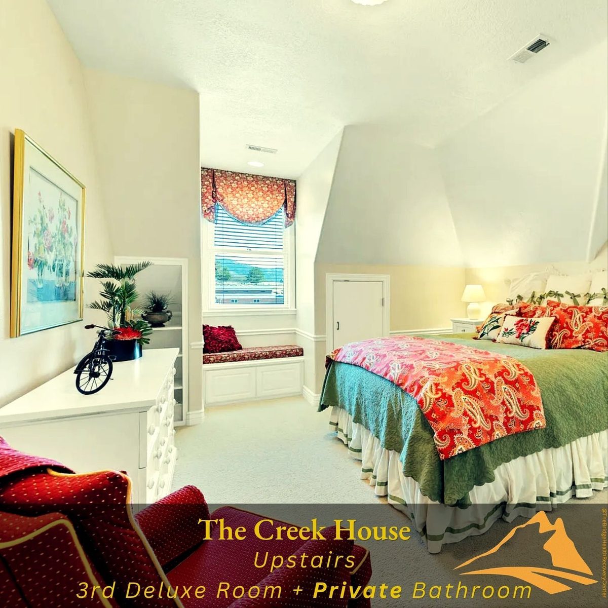 Colorful upstairs deluxe room with private bathroom at The Creek House