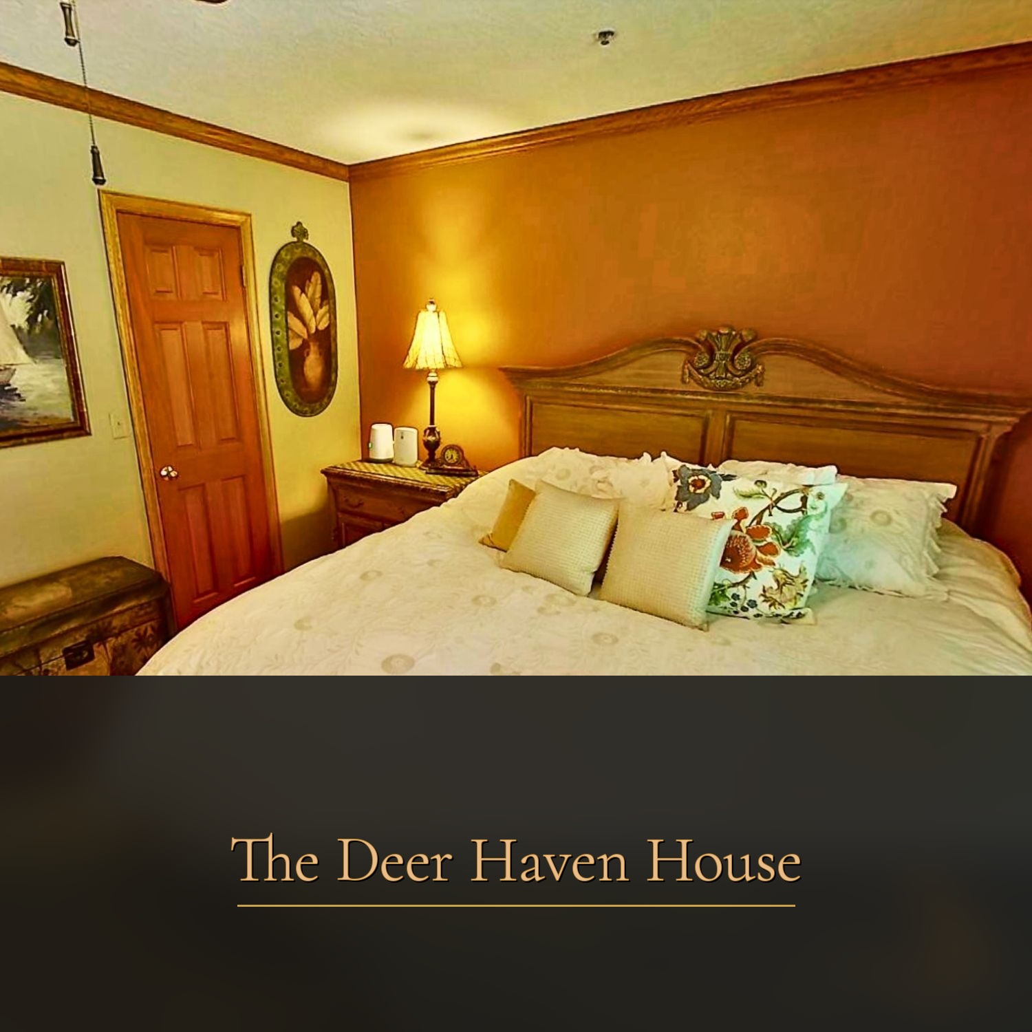 Main floor first bedroom with ornate headboard at The Deer Haven House