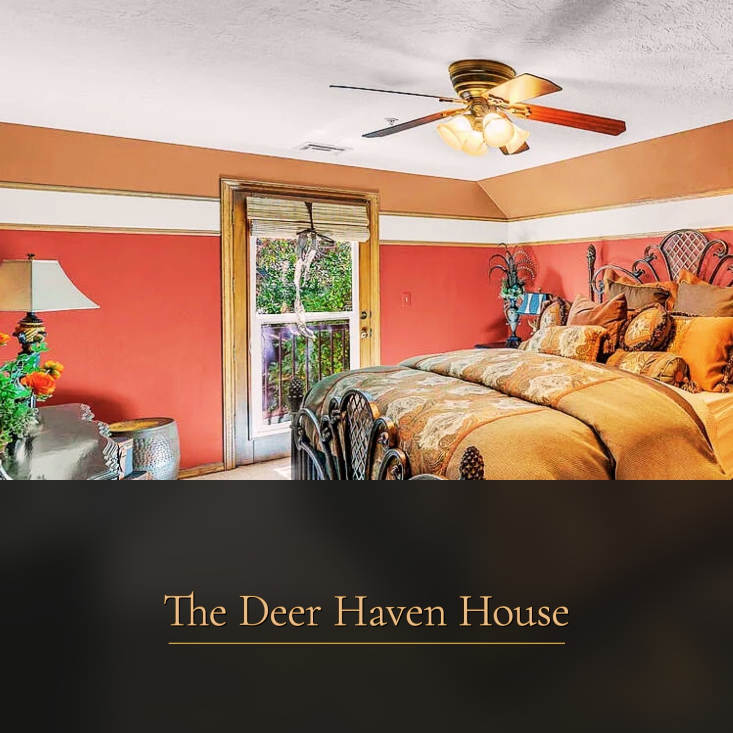 Upstairs bedroom with coral accent walls at The Deer Haven House