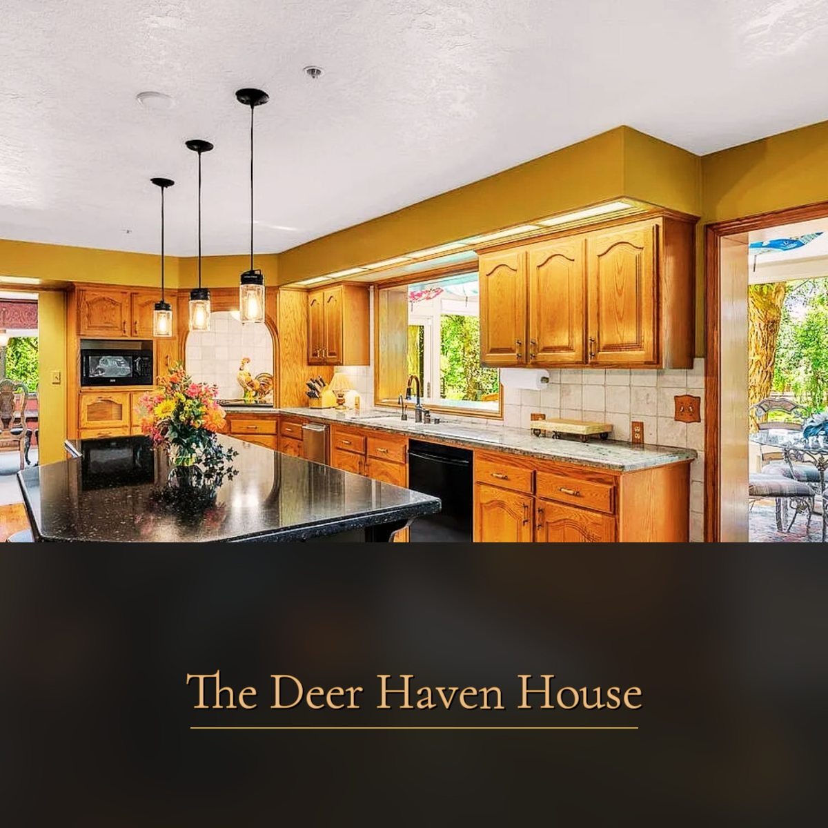 Glass-enclosed sun room with skylights at The Deer Haven House