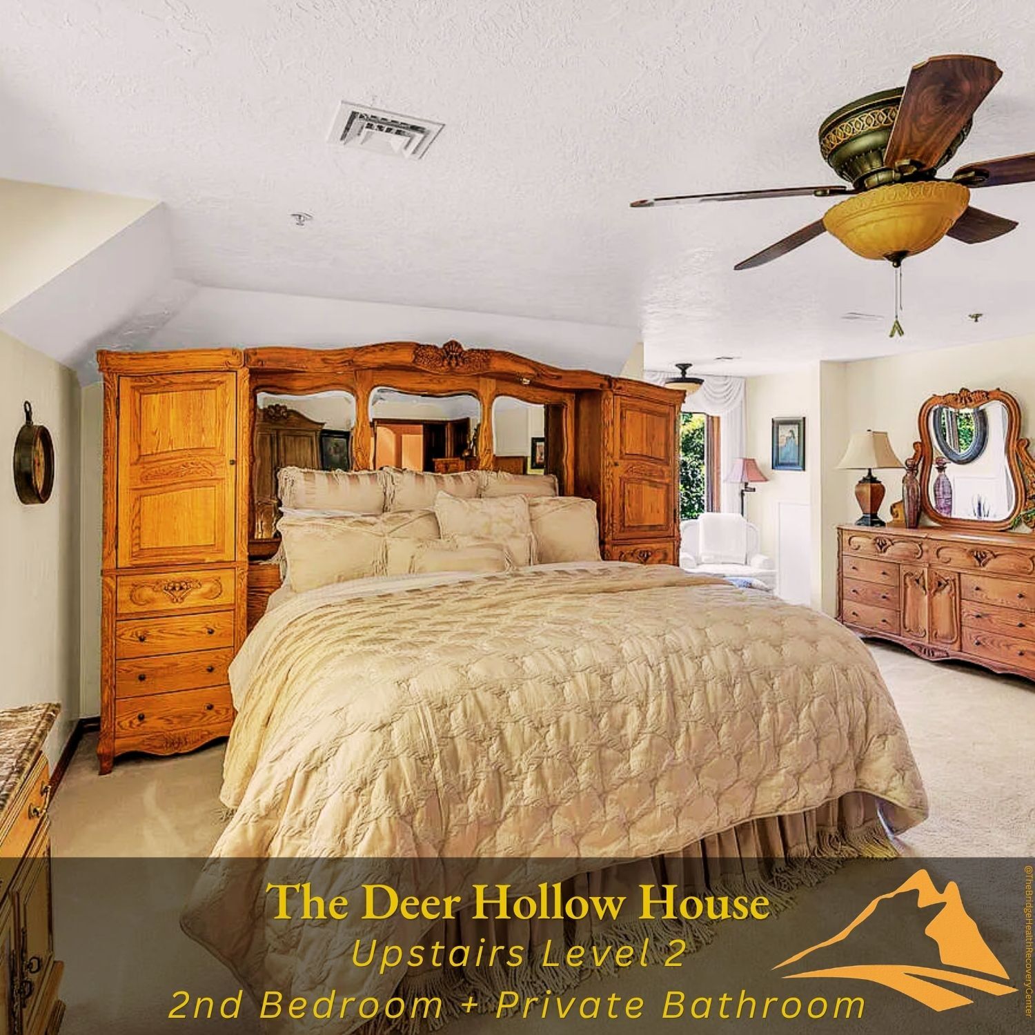 Upstairs second bedroom with ornate oak bed at The Deer Hollow House