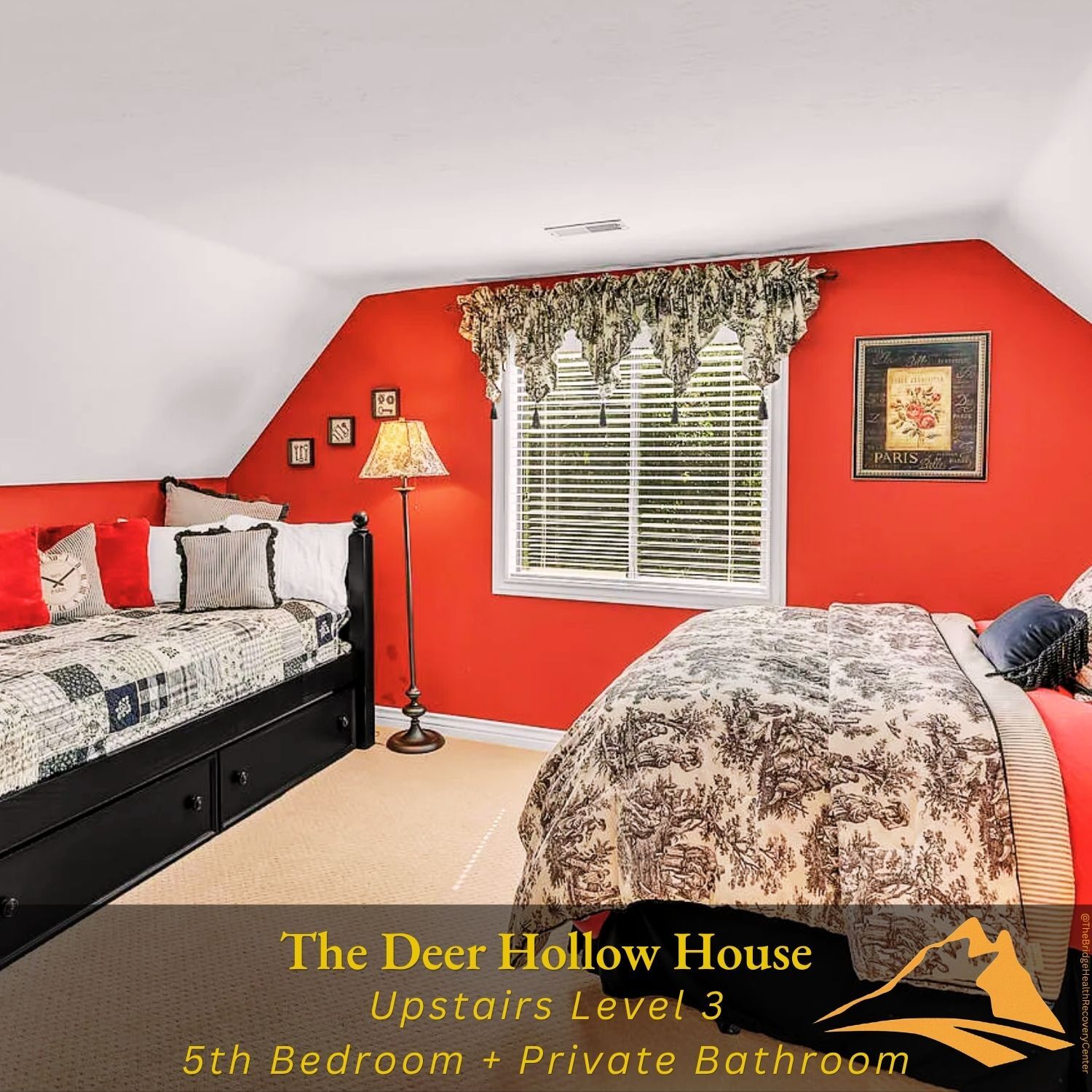 Sixth bedroom with two beds and red walls at The Deer Hollow House