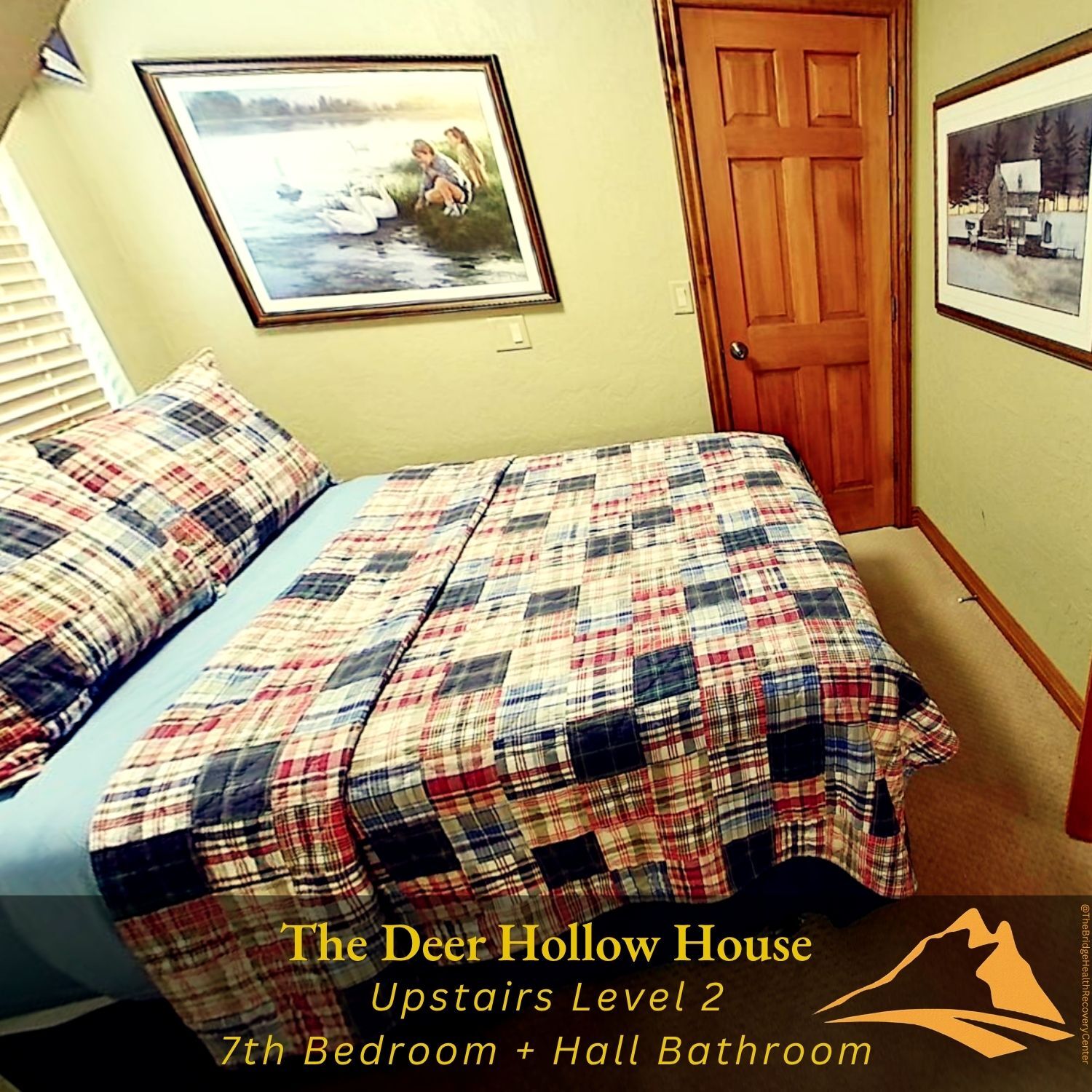 Cozy eighth bedroom with plaid quilt at The Deer Hollow House