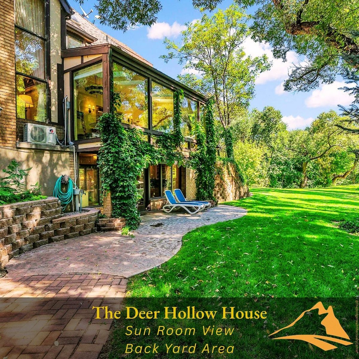 Covered back patio with fire pit at The Deer Hollow House